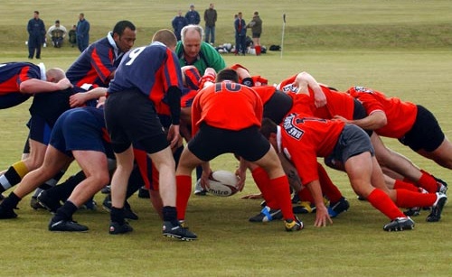 Rugby team scrumming